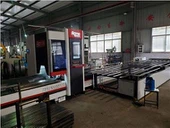 Máy cắt laser ống kim loại với hệ thống nạp bán tự động